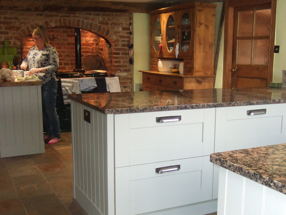 Modern painted kitchen in period home in Felsted